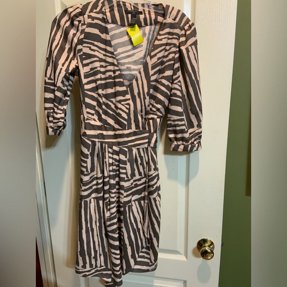 Banana Republic Wrap Dress.  Sheer fabric.  Banded sleeve.  Great neutral print.